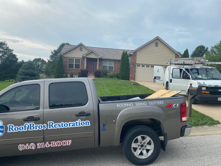 roof bros restoration branded truck 002 - Roof Bros Restoration - roofing gallery wisconsin illinois A tan Roof Bros Restoration pickup with 'ROOFING SIDING GUTTERS' lettering and phone (844) 314-ROOF is parked alongside a...