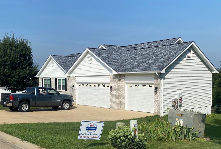 roof bros restoration completed roof 002 - Roof Bros Restoration - roofing gallery wisconsin illinois A white single-story ranch home with a newly shingled grey roof, an attached three-car garage, and a Roof Bros Restoration...