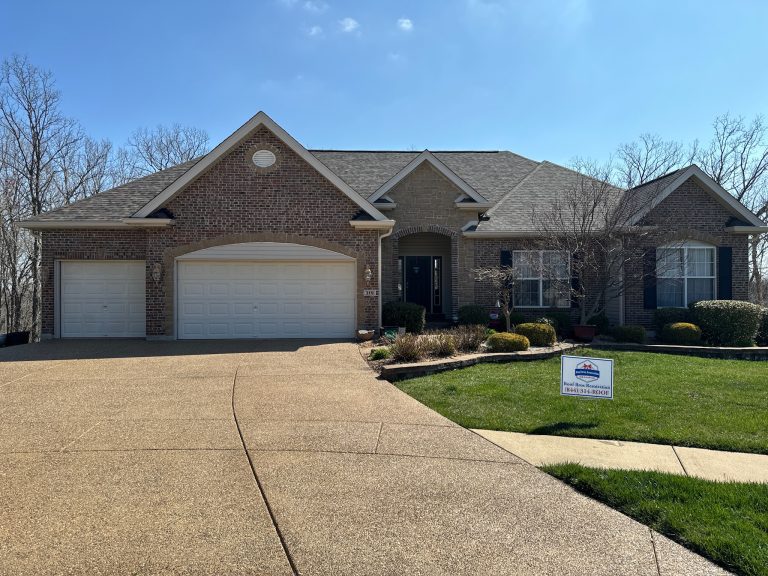 roof bros restoration completed roof 003 2 - Roof Bros Restoration - roofing gallery wisconsin illinois A two-story brick home with a multi-gabled shingle roof and three-car garage, with a Roof Bros Restoration yard sign visib...