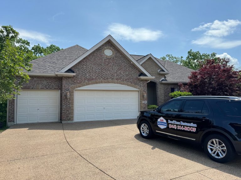 roof bros restoration illinois branded truck 002 - Roof Bros Restoration - roofing gallery wisconsin illinois A brick home with attached two-car and single-car garages and a black Roof Bros Restoration SUV with door magnets parked i...