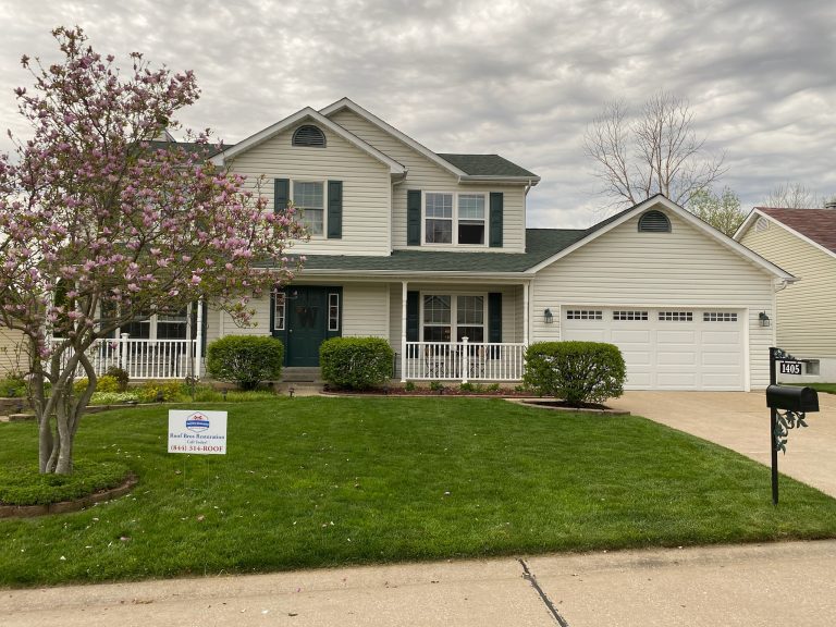 roof bros restoration illinois completed roof 001 - Roof Bros Restoration - roofing gallery wisconsin illinois A two-story white siding home with a green-gray shingle roof and attached garage displays a Roof Bros Restoration yard sig...
