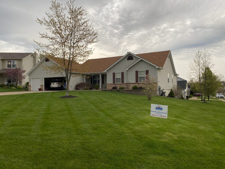 roof bros restoration illinois completed roof 002 - Roof Bros Restoration - roofing gallery wisconsin illinois A one-story ranch-style home with beige siding and dark shutters has a Roof Bros Restoration yard sign on the manicured fr...