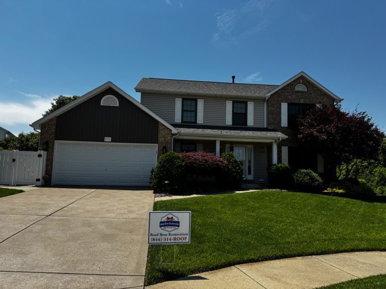 roof bros restoration illinois completed roof 020 - Roof Bros Restoration - roofing gallery wisconsin illinois Two-story residential home with brick and tan siding, dark shingle roof, two-car attached garage, address number 903, whit...